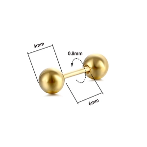 Détail d'un piercing barbell doré en acier avec boule de 4mm et tige de 6mm x 0,8mm