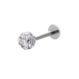 Macro shot of stainless steel labret stud with crystal pave ball and flat base