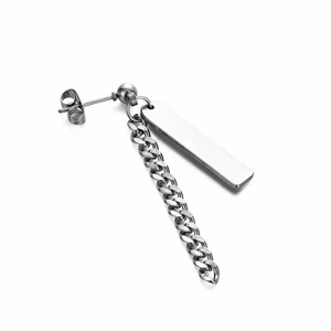 Detailed macro view of silver stainless steel earring with hanging chain and metal tag