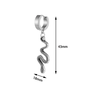 Detailed macro view of snake pendant earring showing textured scales and silver finish