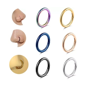 Macro detail of 316L stainless steel seamless nose rings in six metallic colors