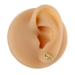 Exquisite double heart stud earrings in gold with pavé cubic zirconia on silicone model