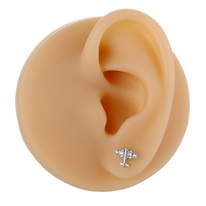 Exquisite copper micro-set airplane stud earrings with zircons for women on silicone ear model