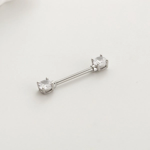 Barbell nipple ring in 16G stainless steel with two round cubic zirconia stones