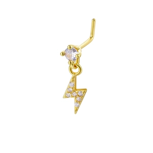 Detail of gold L-shaped nose ring with a dangling lightning bolt and inlaid zircon stones