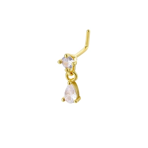 Detail of a golden L-shaped nose stud featuring a round gem and teardrop pendant