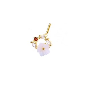 Detailed close-up of 20G L-shaped gold nose stud with shell flower and zircon inlay