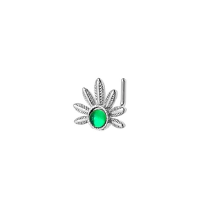 L-shaped silver nose stud with green gemstone and leaf pattern detail on white background