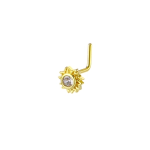 Detailed close-up of 20G L-shaped gold nose stud featuring a sparkling starburst sunburst design