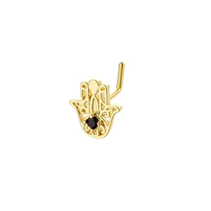 Macro detail of L-shaped nose stud with gold Hamsa Hand and black stone inlay