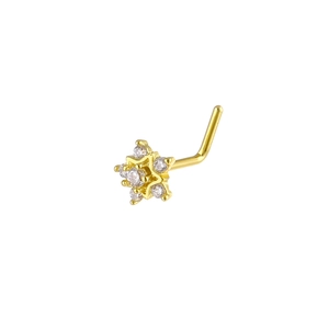 Detail of L-shaped gold nose stud with sparkling star-shaped cubic zirconia setting
