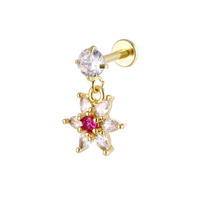 Detailed close-up of golden labret stud with flower pendant and bicolor zircon stones