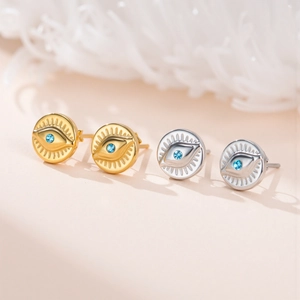 Macro shot of 304 stainless steel Evil Eye stud earrings with blue zircon crystals