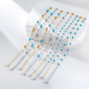 Bohemian 8-piece bracelet set with blue turquoise beads and polished stainless steel charms