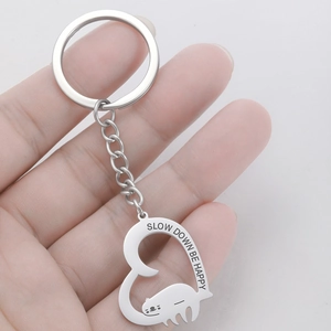 Polished stainless steel sloth keychain with heart pendant engraved Slow Down Be Happy