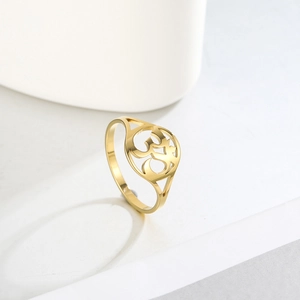 Detailed view of the gold-plated stainless steel ring with a hollow Om sacred symbol