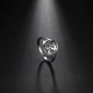 Minimalist silver Om symbol hollow ring in polished stainless steel with spotlight effect