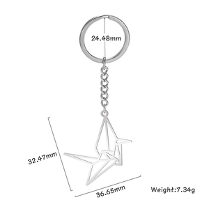 Minimalist silver stainless steel origami crane keychain with dimensions and weight