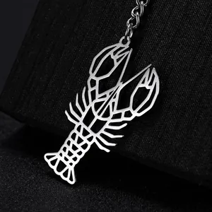 Creative stainless steel lobster keychain with hollow design and silver metallic finish