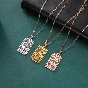 Detailed macro view of Aries zodiac necklaces in silver, gold, and rose gold finishes