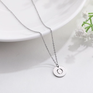 Minimalist silver titanium steel necklace with 12mm round cutout letter O pendant