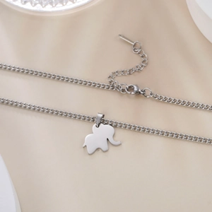 Detailed view of elephant pendant necklace with lobster clasp and extension chain