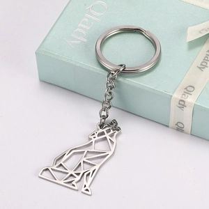 Hollow geometric wolf keychain in polished stainless steel with gift box and ribbon