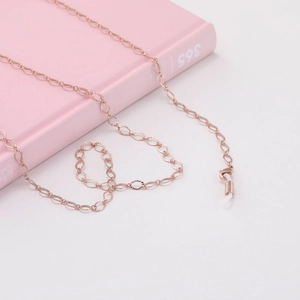 Close-up of rose gold hollow diamond link chain with non-slip silicone loops for glasses