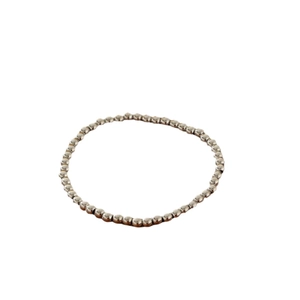Polished silver beaded titanium steel stretch bracelet with small shiny round beads
