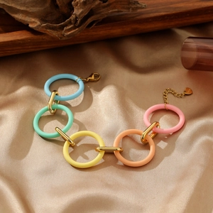 Colorful acrylic and stainless steel bracelet with vibrant round links and heart charm