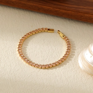 Elegant 18k gold plated tennis bracelet with sparkling pink and orange crystals for women
