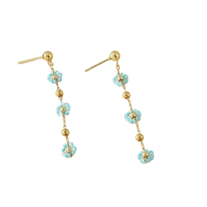 Fresh blue daisy drop earrings with floral beads and golden chains on white background