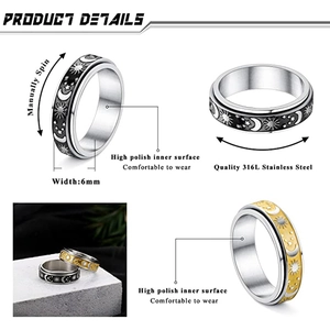 Rotating stainless steel fidget ring with sun moon and star pattern in black and gold