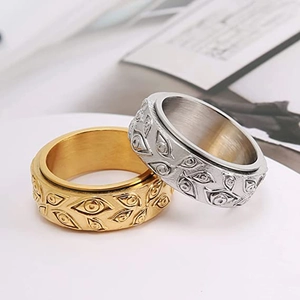 Rotating stainless steel spinner rings with Eye of Providence in gold and silver