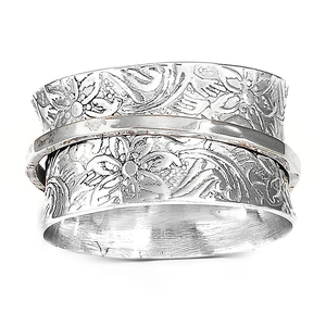 Vintage brede spinner ring in zilver met gedetailleerd bloemreliëf voor stressverlichting