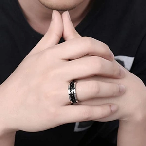 Close-up of men's stainless steel ring featuring a black Cuban chain inlay design