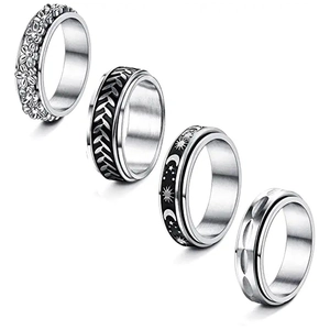 Set mit vier rotierenden Titanstahlringen mit himmlischen Sternmond- und Blumengravuren