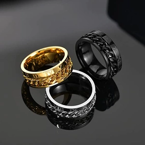 Three men's titanium steel rotating rings with Roman numerals and cuban chain design