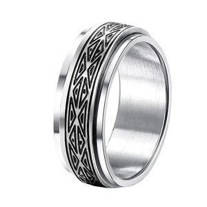 Polished titanium steel fidget ring with rotating chain and geometric engraved pattern