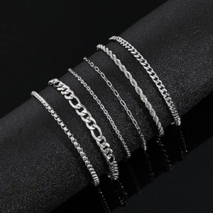 Set of six minimalist stainless steel chain bracelets with Cuban and Figaro link styles