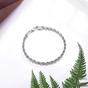 Close-up of polished stainless steel rope chain bracelet with durable lobster clasp