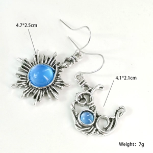Boucles d'oreilles asymétriques soleil et lune en argent vintage avec pierre de lune