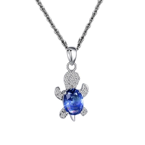Elegant turtle pendant necklace with oval blue gemstone and shimmering white zircon accents