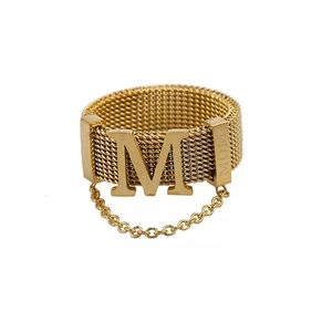 Golden mesh band ring featuring bold letter M and MOM engraving with chain details