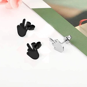 Detail of punk stainless steel stud earrings featuring a middle finger gesture in black and silver