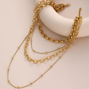 Multi-layer 18k gold plated stainless steel necklace featuring bead chain and link details