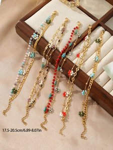 Detail of bohemian gold chains with colorful crystal flowers and 17.5-20.5cm adjustable clasps
