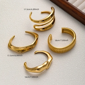 Lot de 4 bracelets joncs dorés en acier inoxydable avec motifs ondulés et lisses