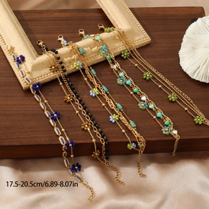 Minimalist 18K gold-plated stainless steel floral bracelet set with colorful bead charms