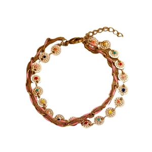 Bracciale multistrato bohémien in acciaio dorato con ciondoli a pois colorati